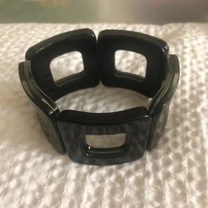 Black resin bracelet.